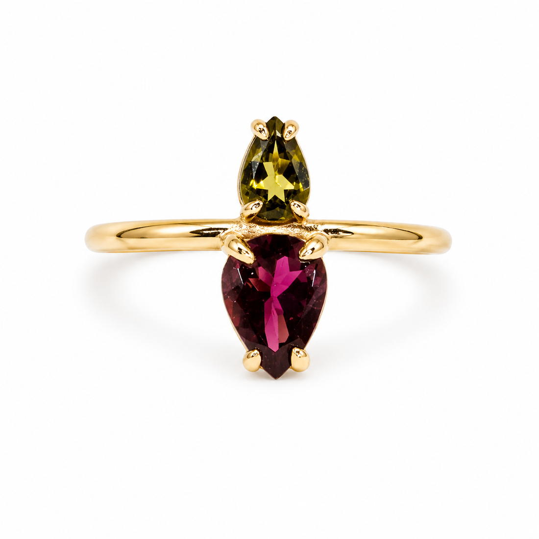 Gold ring with a green and red gemstone on a white background