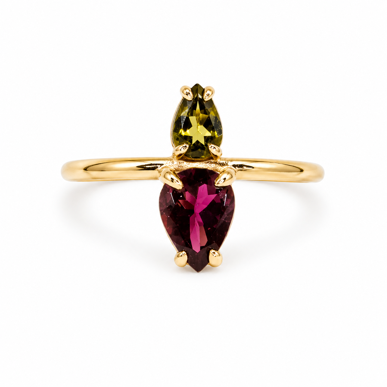 Gold ring with a green and red gemstone on a white background