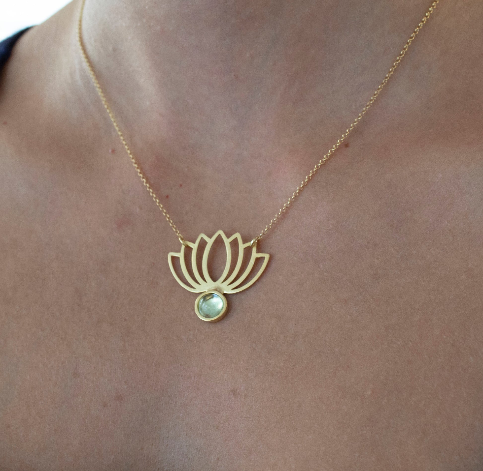 lotus necklace with topaz stone
