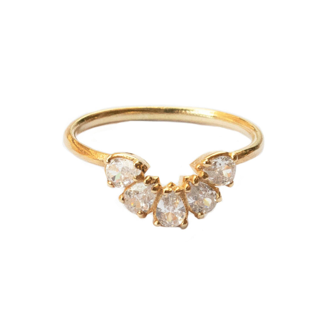 Gold ring with diamond-shaped stones on a white background