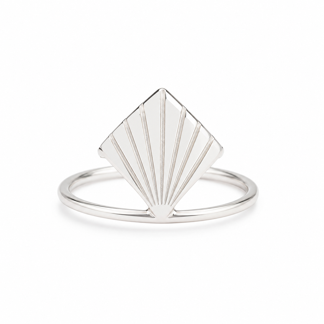 Silver ring with a geometric fan-shaped design on a white background