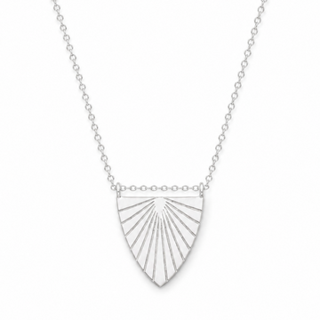 Silver necklace with a sunburst pendant on a white background