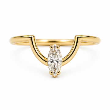 Gold ring with a marquise-shaped diamond on a white background