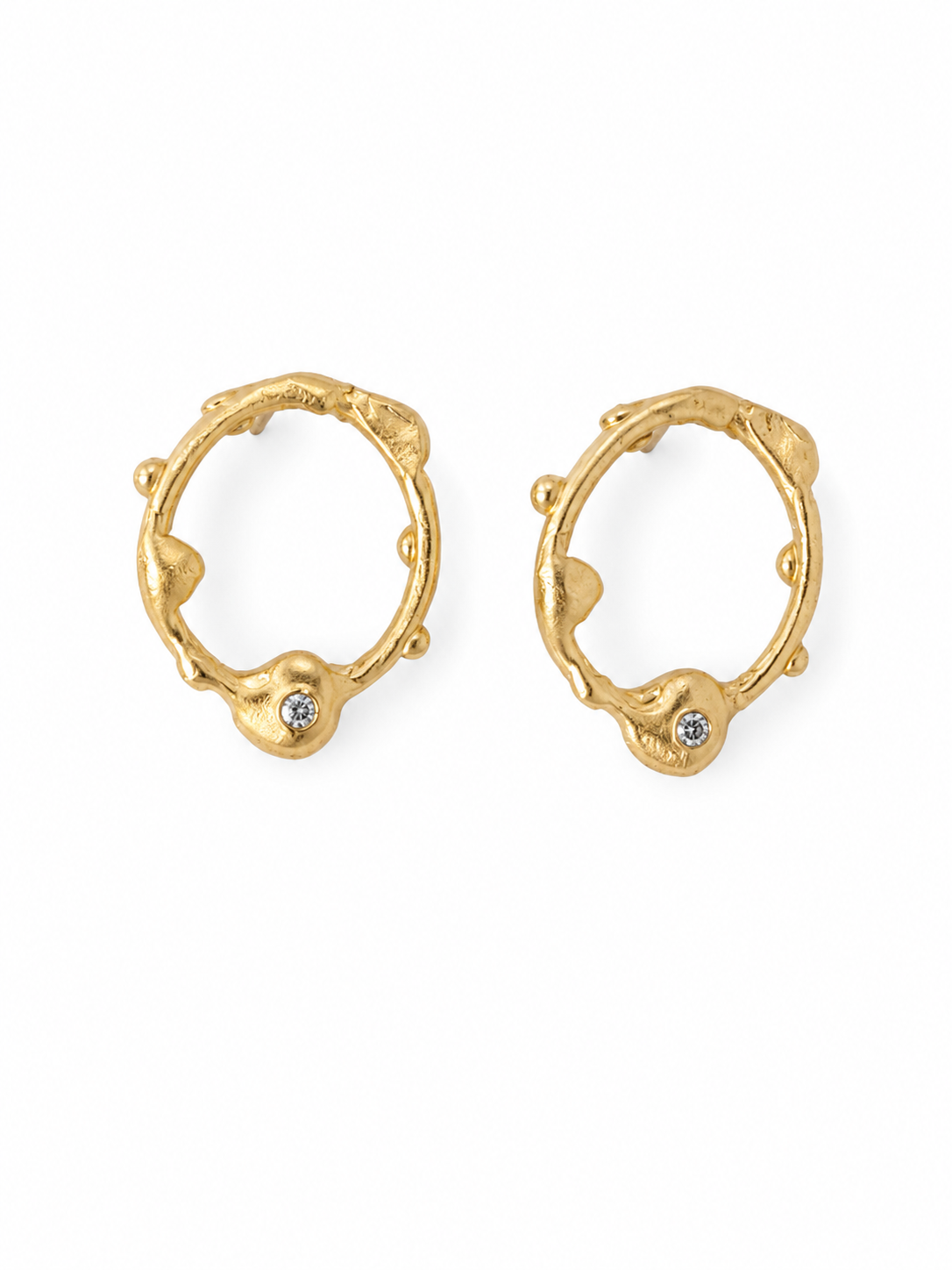 Pair of gold hoop earrings with small stones on a white background