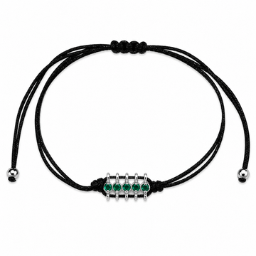 Black cord bracelet with green beads on a white background