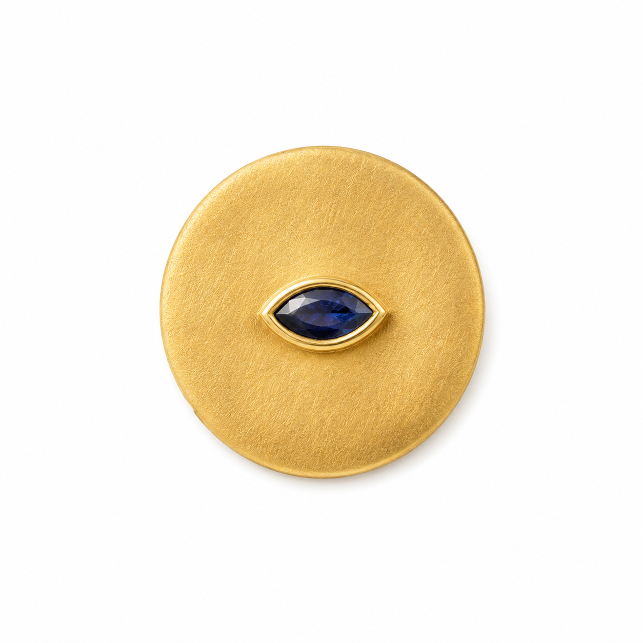 Gold circular ring with a blue gemstone on a white background