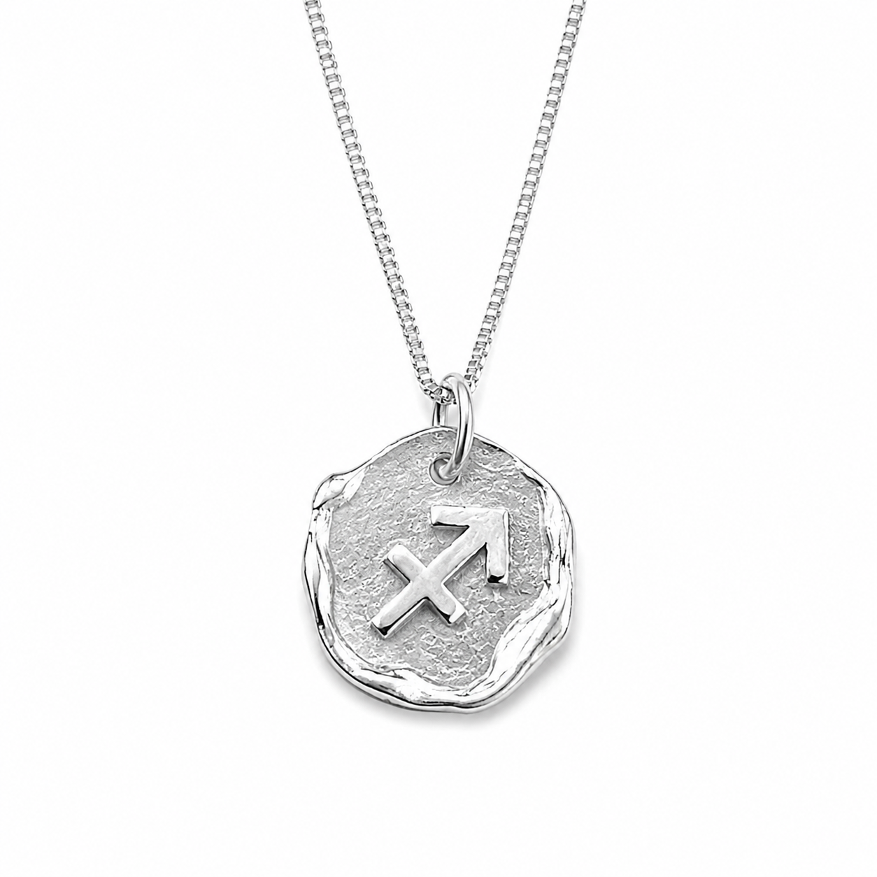 Silver necklace with a zodiac pendant on a white background