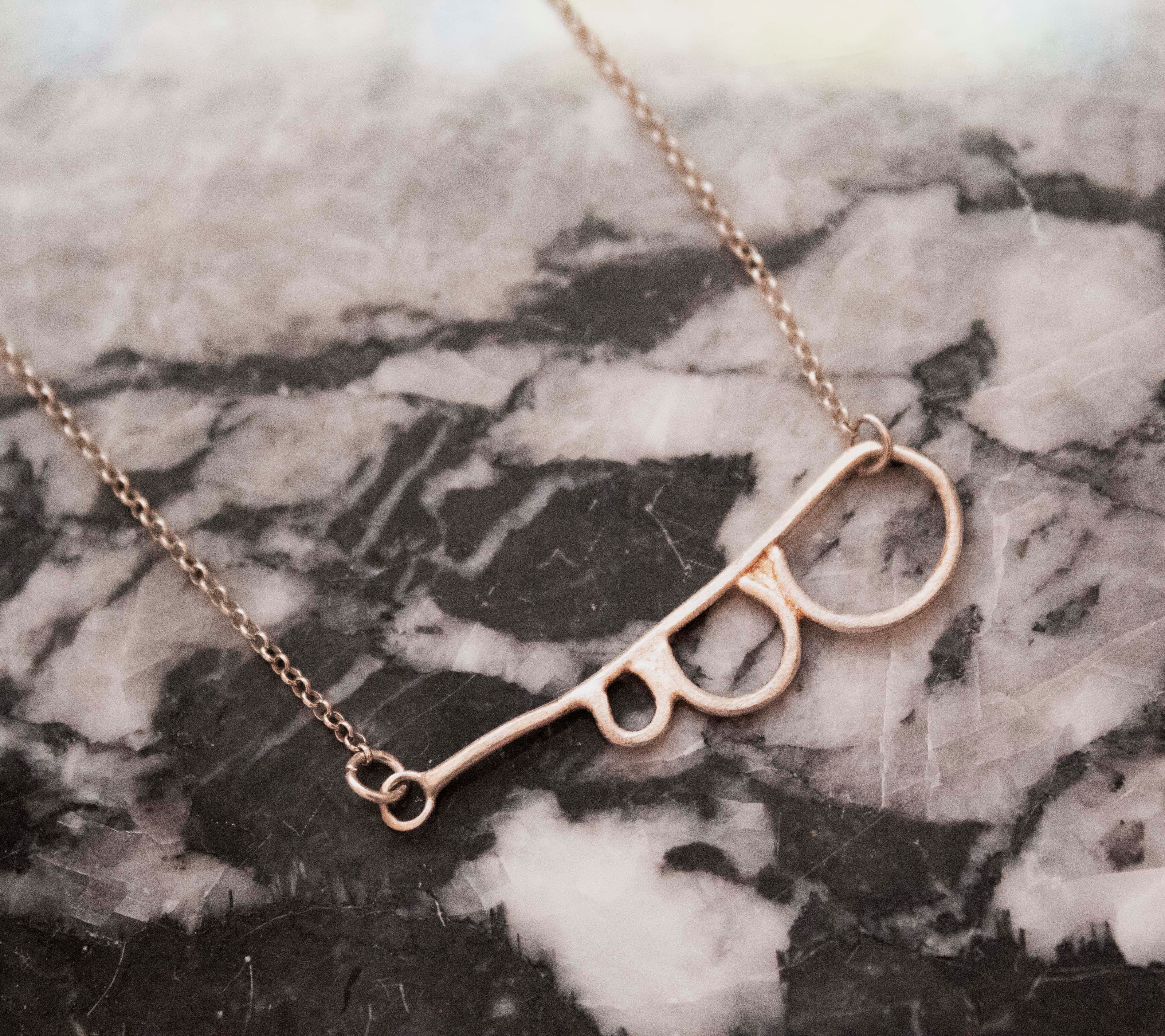 Bauhaus  Escalated Circles Minimal Necklace